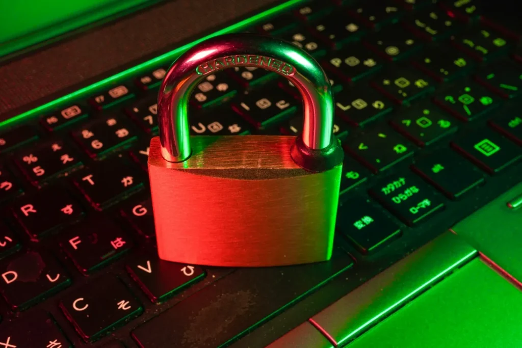Padlock lying on a laptop keyboard